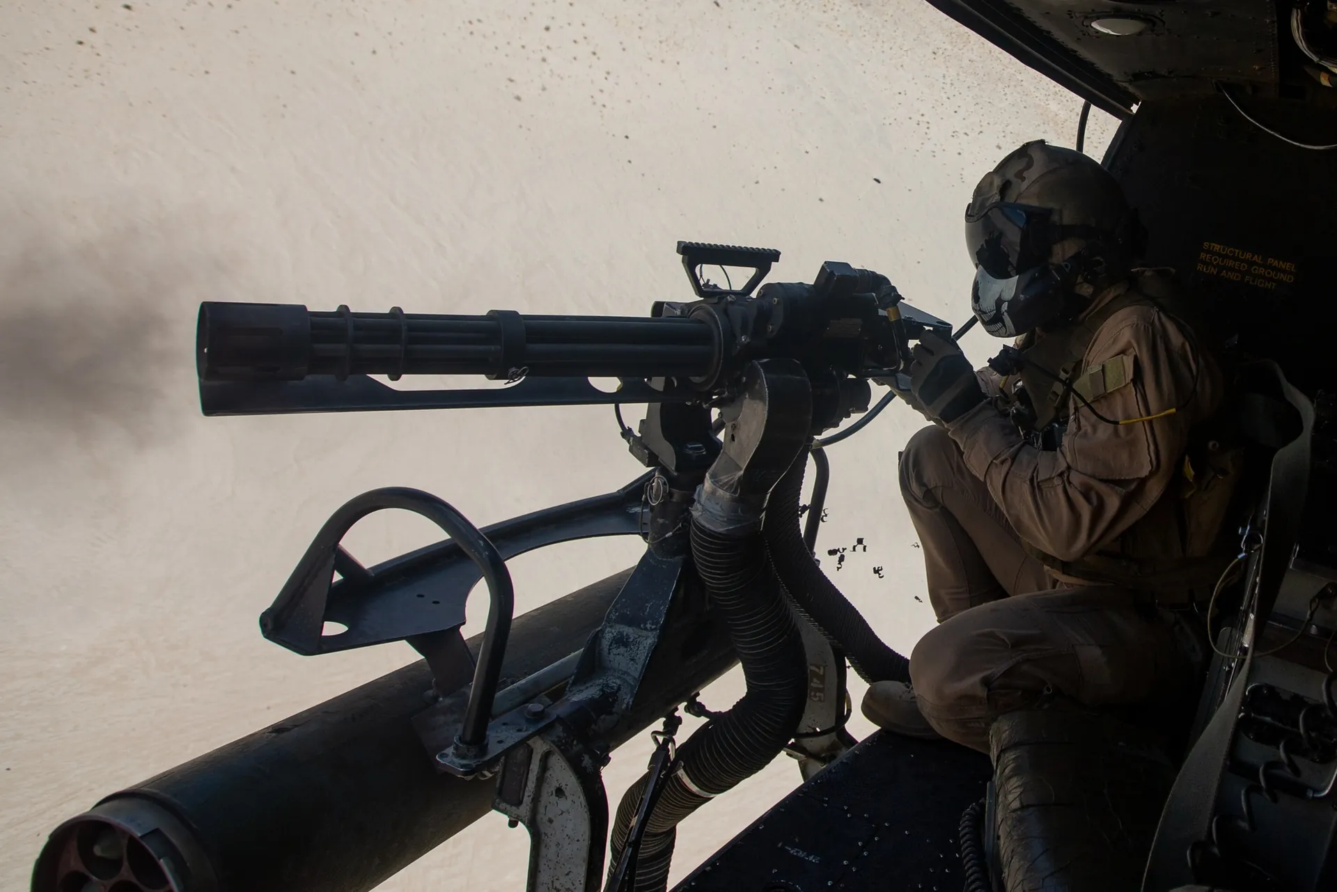 M134-class minigun on a mounted position, representative host class