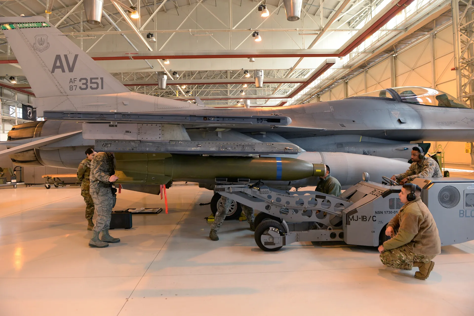 Aircraft weapons loading, representative of launcher and stores handling
